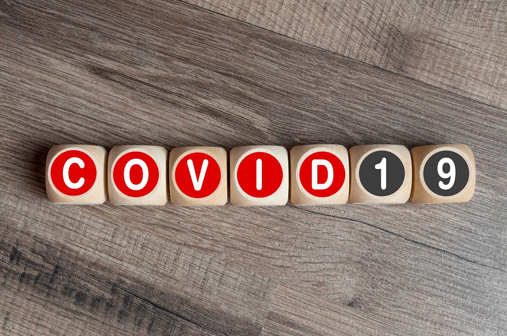 COVID-19 Graphic - Wooden blocks on table